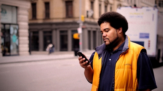 A man looking at his smartphone